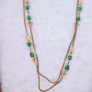 vintage gold toned chain with emerald green acrylic connectors